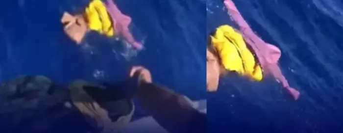 فيديو مؤلم.. سوري يلقي جثة طفله بالبحر بعد وفاته جوعاً